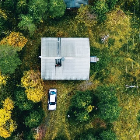 Overhead shot of home in wooded area
