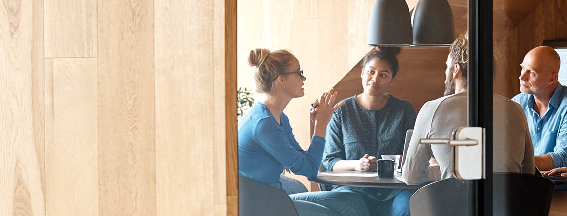 Group of people having a discussion in a conference room 