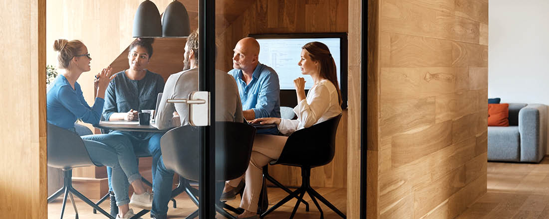 Group of people having a discussion in a conference room 