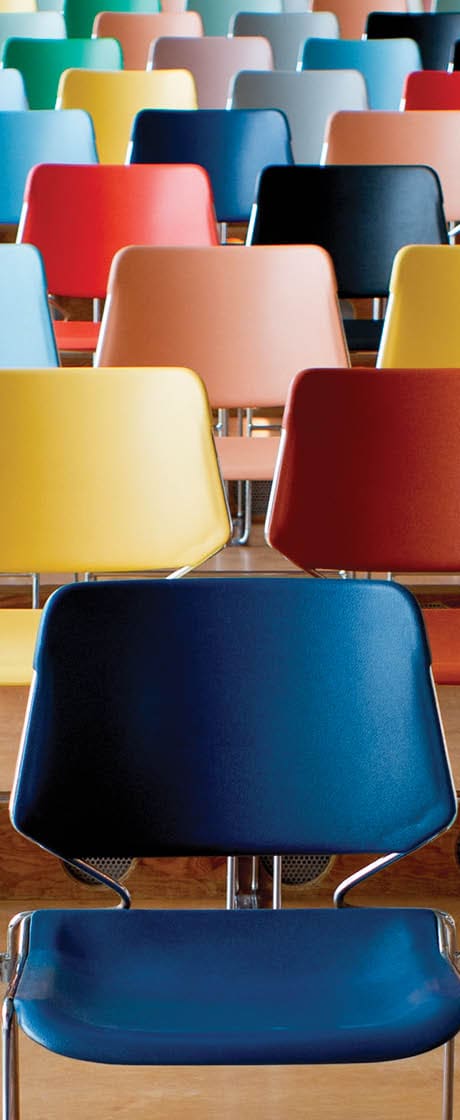 Empty chairs in a room ready to be filled by eager learners