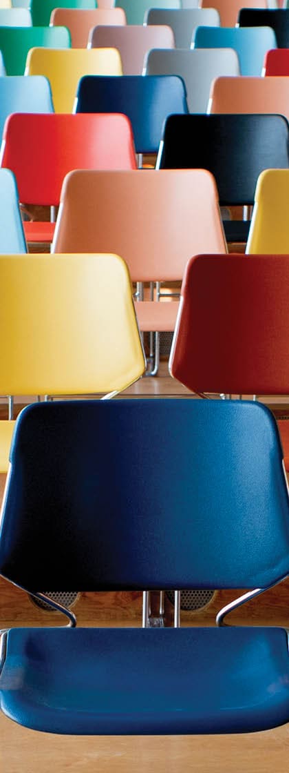 Empty chairs in a room ready to be filled by eager learners