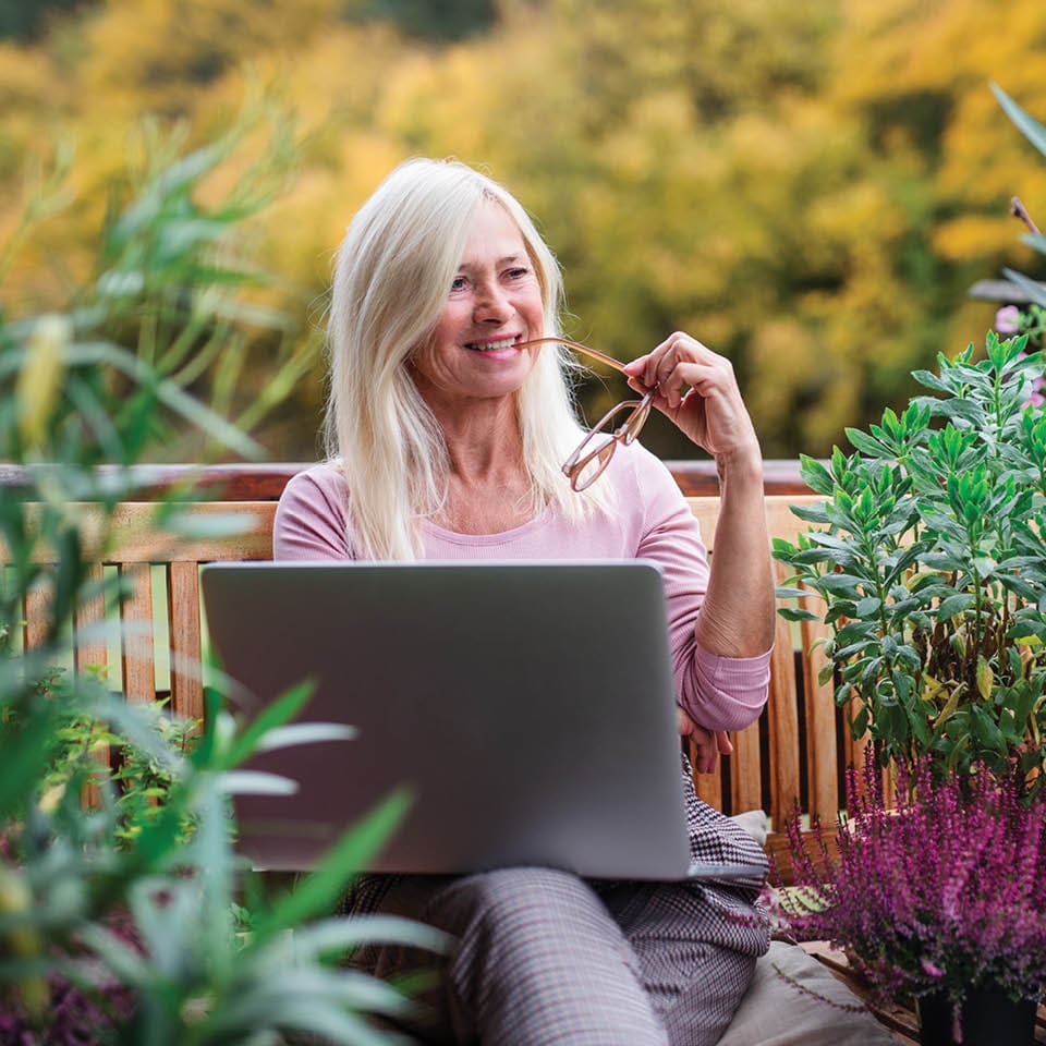 Image of older woman with laptop.